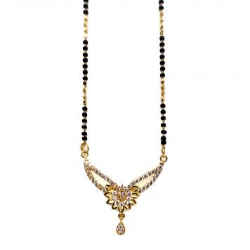 Flower Tanmaniyas Black Beeds Necklace Set by Maha Gaur...